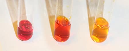 Color transition of Methyl red solution under different acid-base conditions