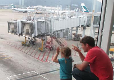 Checking out the planes at Hong Kong airport