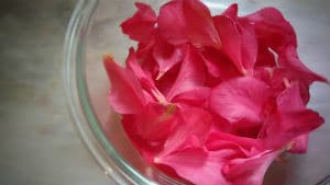 Pink petals in a clear pyrex bowl