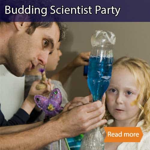 A child watching a tornado in a bottle experiment