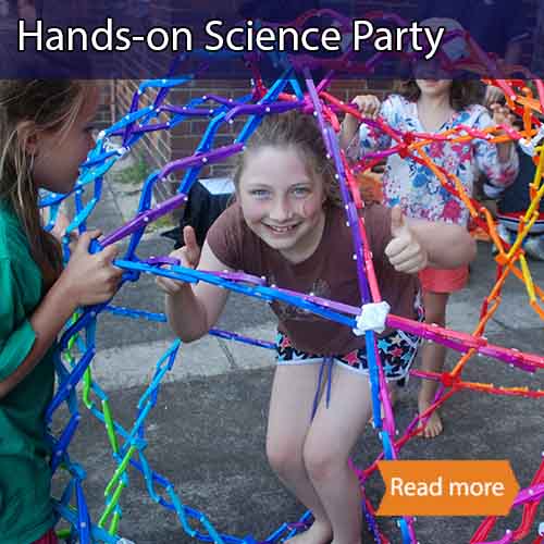 A girl inside a hoberman sphere