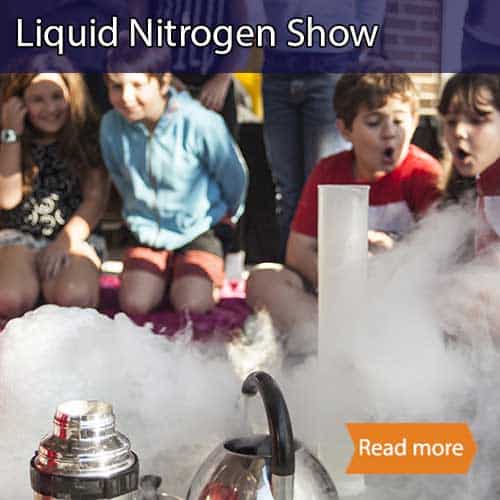 Kids amazed whilst watching fog clouds over liquid nitrogen