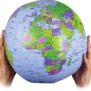 An Inflatable Globe held between two hands. Africa is shown with it's geopolitical regions identified.