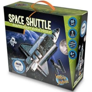 Space shuttle floor puzzle box, showing the space shuttle in space